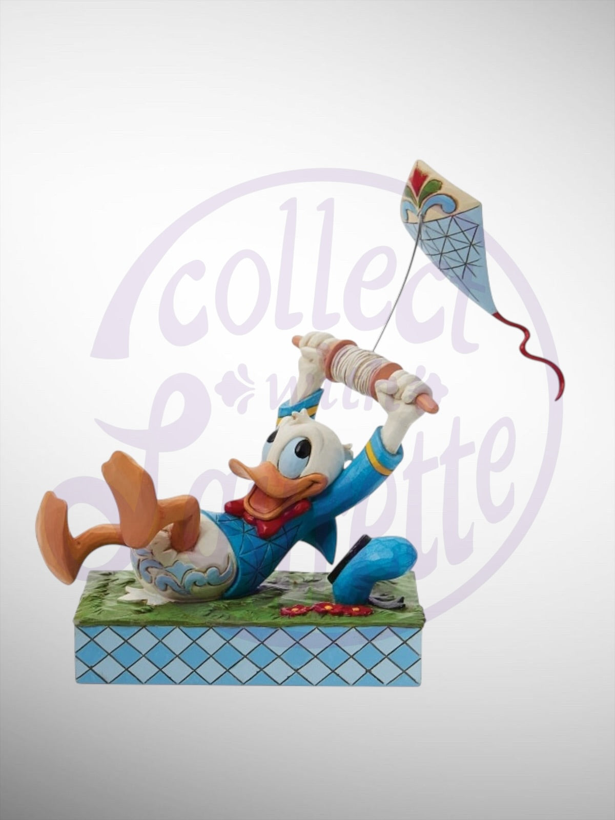 Jim Shore Disney Traditions - A Flying Duck Donald Duck Kite Figurine
